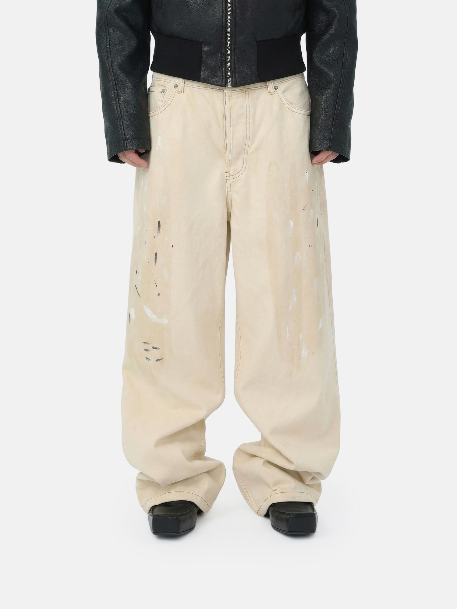 Pantalones desgastados color marfil