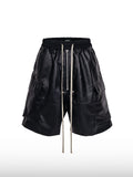Short enduit zippé