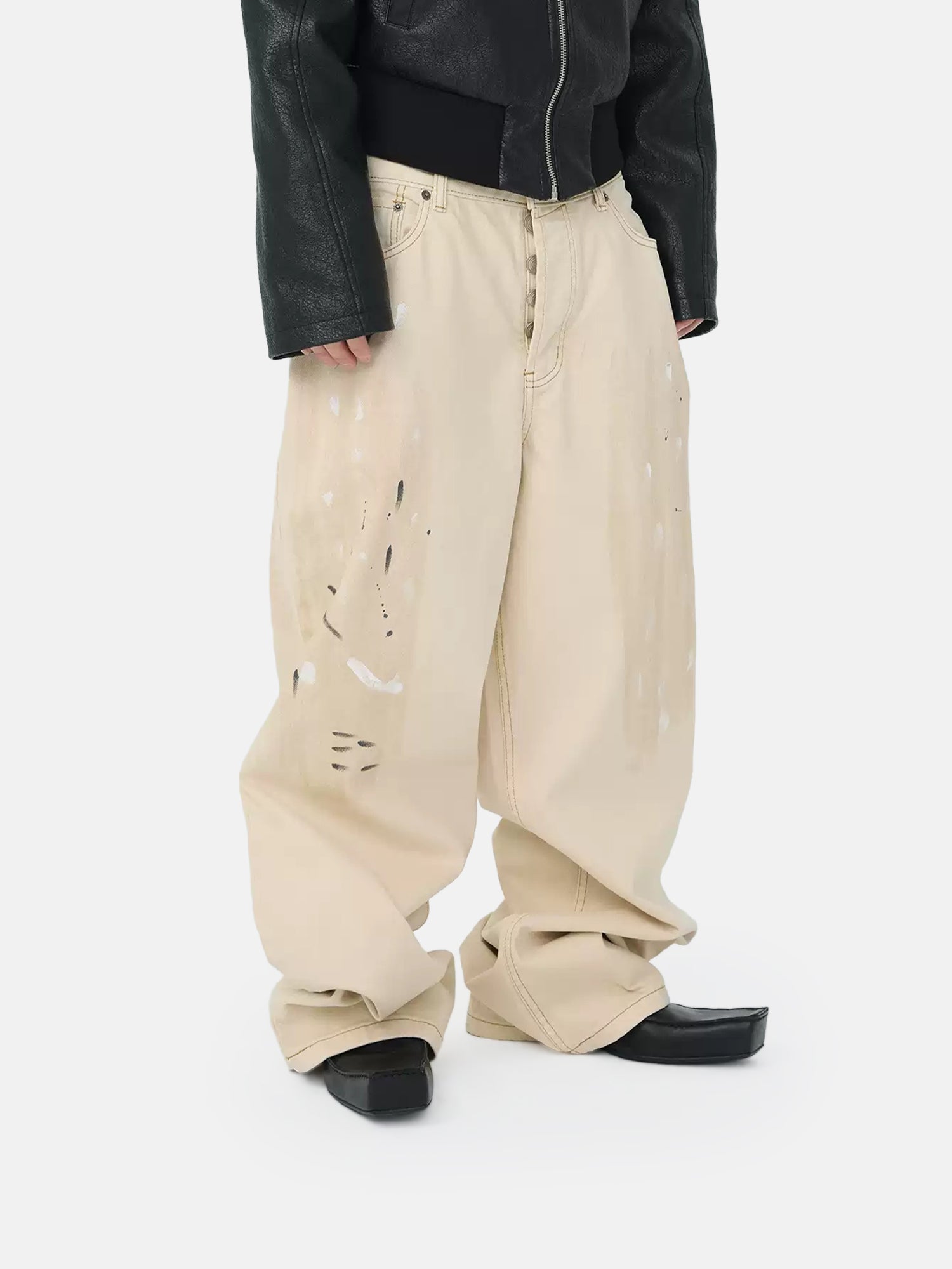 Pantalones desgastados color marfil