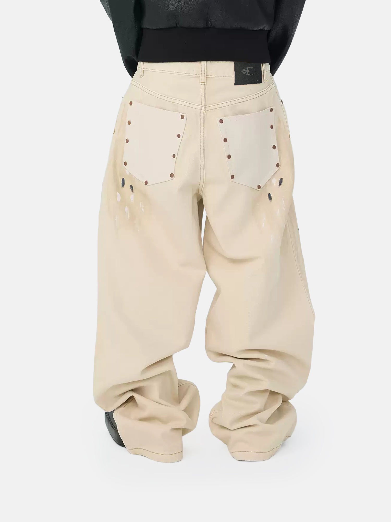 Pantalones desgastados color marfil